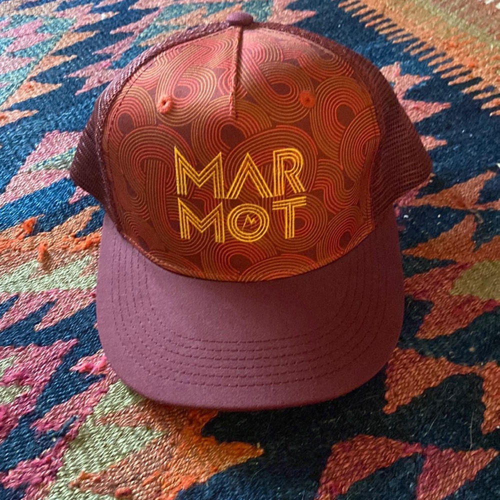 Marmot trucker style hat; maroon and gold funky pattern.  O/S.  Never worn!